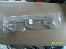 18664 Corteco Exhaust Manifold Gasket Set. New