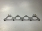 New MR497557 Exhaust Manifold Gasket For 2002-2007 Mitsubishi Lancer 2.0L. Price: $11.95.
