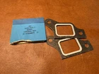 Nos Ford D1FZ-9448-B Pair Of Exhaust Manifold Gaskets New. Price: $14.00.