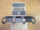 Mopar Exhaust Manifold Gasket (lt) - Nos '60'S "318" Truck P/n 1670508 New. Price: $25.00.