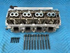 Genuine Mopar Engine Cylinder Head W/exhaust Manifold Lh 20K 68280503AE Oem Used. Price: $575.00.