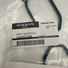 Manifold Gasket Genuine Nissan Part # 14035-5TA0B Oem Nos New. Price: $30.00.